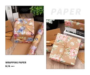Detailansicht von vintage floralem Kraftpapier-Rollen mit natürlicher Juteschnur und Anhängern