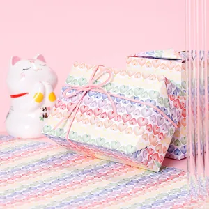 Vibrant rainbow heart pattern wrapping paper for DIY birthday and festive gift packaging