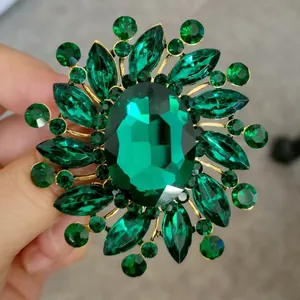 Vintage emerald green crystal flower brooch with gold plated alloy setting for women
