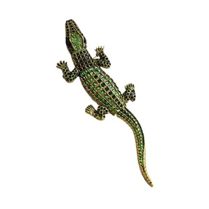 Exquisite green rhinestone crocodile brooch with flexible movable body for clothing.