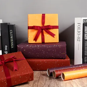 Luxury gold foil star gift wrapping paper set in brownie red and deep wine colors