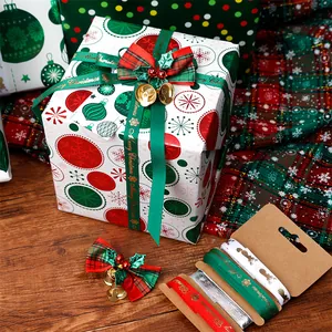 Detail shot of festive Christmas wrapping paper and assorted decorative ribbons on wood.