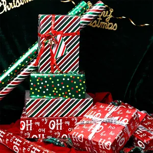 Festive Christmas wrapping paper set with red stripes, dots, and HO HO HO patterns