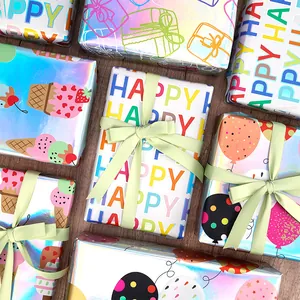 Papel de regalo láser colorido con alegres diseños de helados y globos vivos