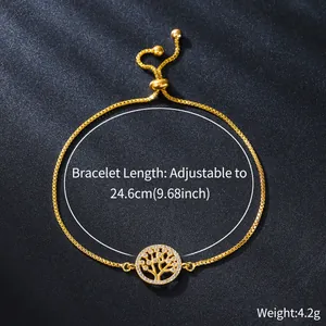 Close-up of gold plated tree of life bracelet with zircon stones and adjustable box chain