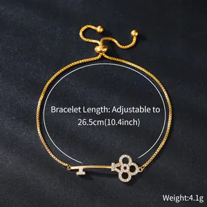 Elegant adjustable gold-plated key bracelet with sparkling cubic zirconia for women