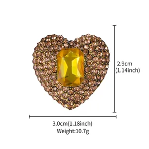 Measurement details of heart shaped brooch with yellow gemstone and amber rhinestones