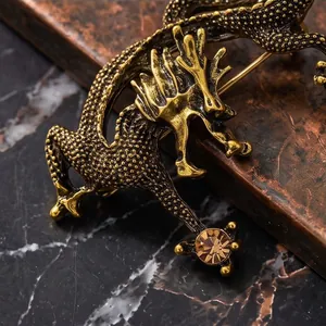 Dettagliata spilla a forma di drago vintage in bronzo con cristallo ambra per uomo
