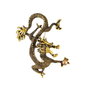 Spilla a forma di drago dorato vintage per abito da uomo con strass ambrato