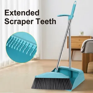 Blue broom and dustpan set with scraper teeth for hair removal on wooden floor