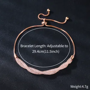 Close-up of rose gold zircon bracelet detail showing adjustable length and 4.7g weight info