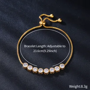Close-up of adjustable gold-toned bolo bracelet with eight sparkling cubic zirconia stones