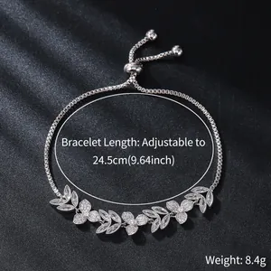 Detail view of silver adjustable zircon flower bracelet with length and weight info