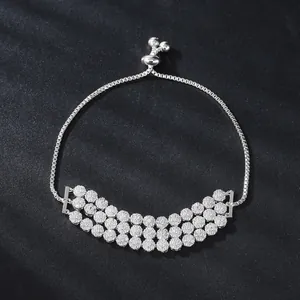 Adjustable silver-toned bracelet with triple-row cubic zirconia flower clusters