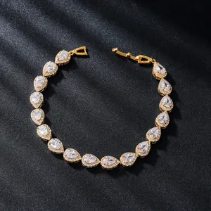 Exquisite gold-plated bracelet featuring pear-shaped cubic zirconia stones in a halo setting