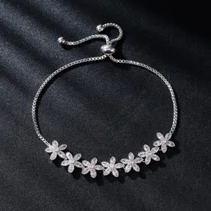 Adjustable silver flower bracelet with sparkling cubic zirconia for luxury look