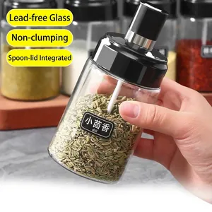 Lead-free glass seasoning jar with integrated spoon and lid for kitchen storage