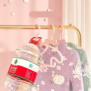 Cintres roses antidérapants multifonctions pour l'organisation de la chambre de bébé