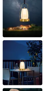 Lanterne LED portable brillant sur une table de terrasse la nuit sous un ciel étoilé