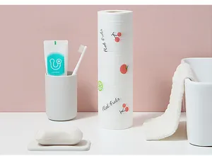 Detailed view of patterned disposable kitchen paper roll in a bathroom setting