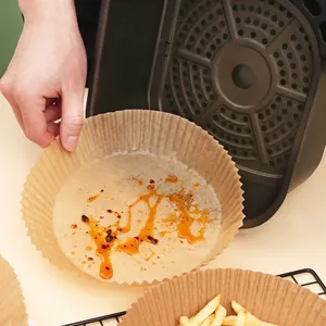 50pcs round disposable air fryer paper liners showing oil-proof and waterproof features
