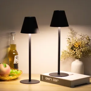 Modern matte black cordless LED table lamp for atmospheric bar and restaurant lighting