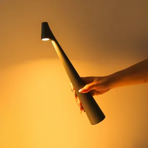 Minimalist cone-shaped LED rechargeable desk lamp for warm bedroom atmosphere lighting