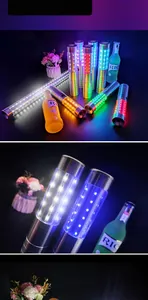 Detailed view of rechargeable LED champagne flash sticks in various colors for bars