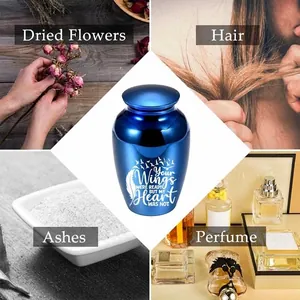 Small blue commemorative cremation urn for human and pet ashes or hair keepsakes