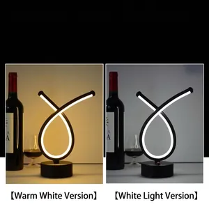 Creative loop-shaped LED rechargeable table lamp in warm and cool white light options.