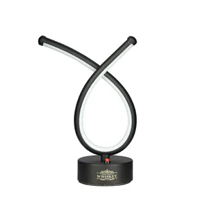 Minimalist black rechargeable LED bar table lamp with creative twisted light tube design