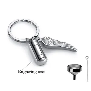Stainless steel cremation urn keychain with angel wing charm and fill kit for memorial use