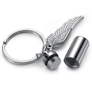 Stainless steel angel wing cremation urn keychain memorial pendant for ashes cylinder charm.