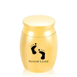 Small gold stainless steel pet urn with footprints and Forever Loved engraving