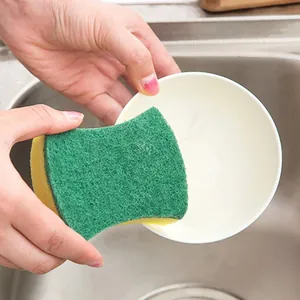 Ergonomic double-sided kitchen sponge scourer for efficient dishwashing in a sink