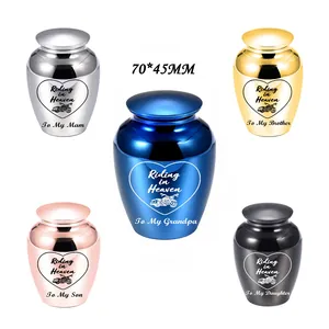 Set of five mini stainless steel cremation urns with motorcycle 'Riding in Heaven' design