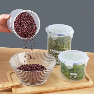 Set of transparent airtight plastic storage jars for kitchen grains and dried fruits