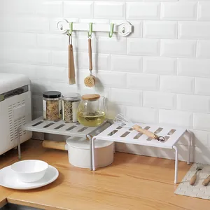 Expandable kitchen cabinet organizer shelf for pots and spices