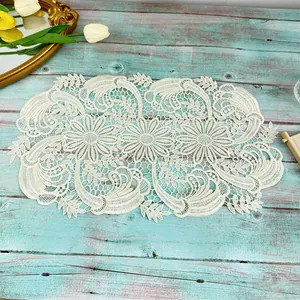 Elegant off-white water-soluble lace placemat with intricate floral pattern for home table decor