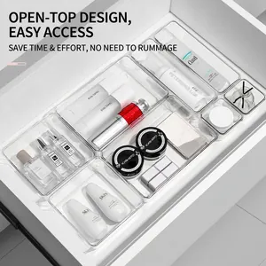 Set of clear acrylic drawer organizer bins for cosmetics and office stationery storage