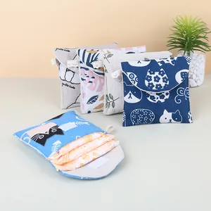 Set of cute floral and cat pattern portable sanitary napkin storage pouches for girls