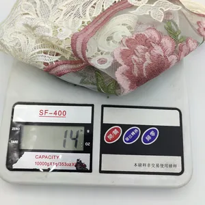 Detailed view of the rose embroidery lace coaster weight measurement at 14 grams