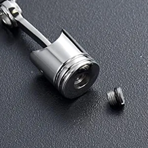 Detail of the waterproof screw cap on a piston-shaped cremation jewelry urn pendant.