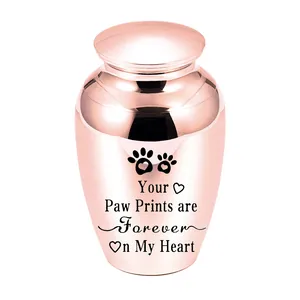 Elegant rose gold pet cremation urn with paw prints and heart-shaped memorial engraving