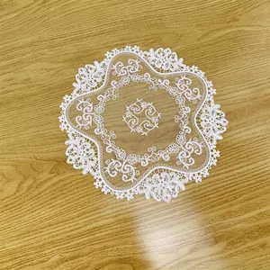 Elegant white circular embroidered lace tablecloth with delicate floral patterns