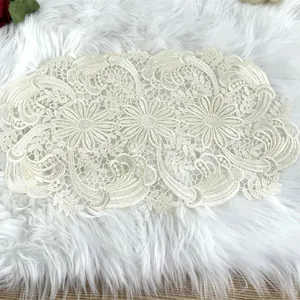 Exquisite water-soluble lace placemat with intricate floral hollow-out design detail