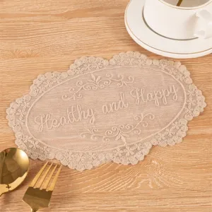 Detailed view of a vintage beige lace coaster featuring elegant Healthy and Happy embroidery