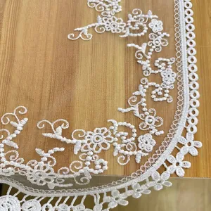 Elegant white floral embroidered lace table runner with hollow mesh design