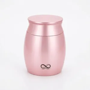 Elegant rose gold memorial keepsake urn for pet or human ashes with heart and bird design