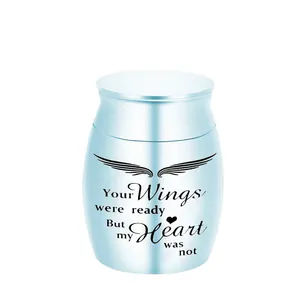 Blue stainless steel pet cremation urn with angel wings and memorial text design